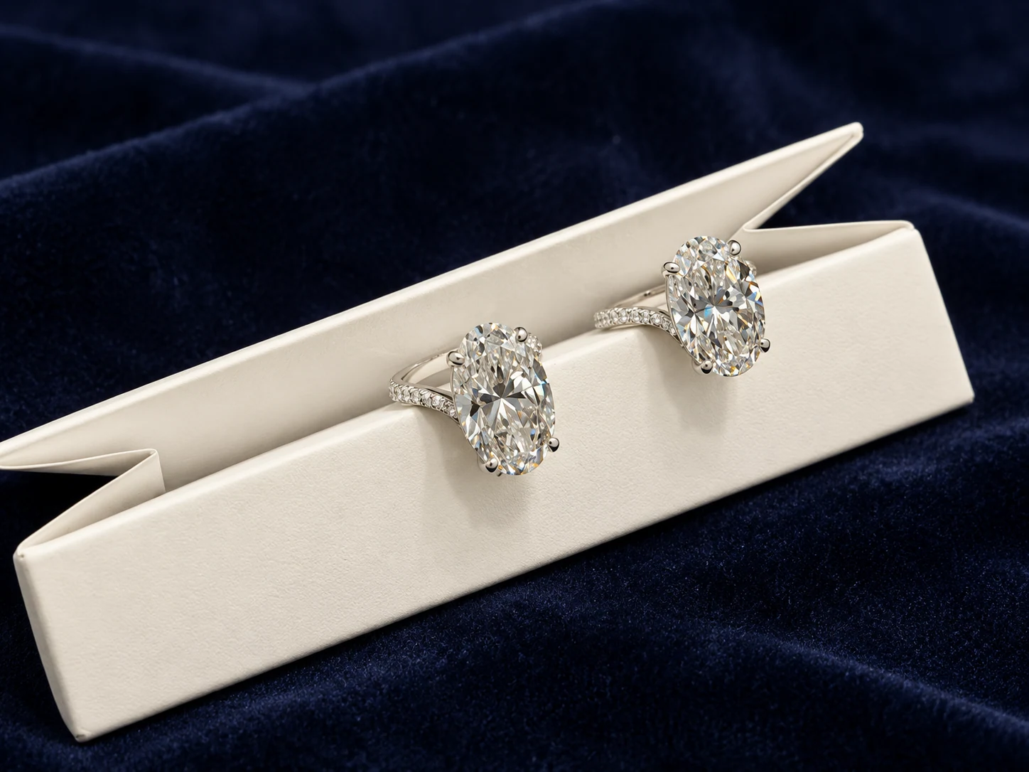 Oval rings on an ivory display